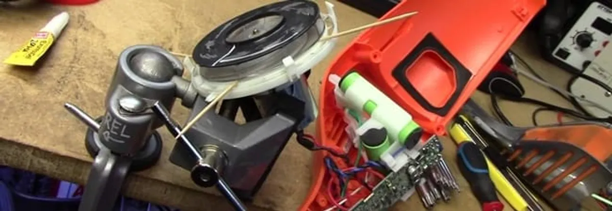 Vacuum cleaner repair parts and tools on a workbench in El Paso, TX
